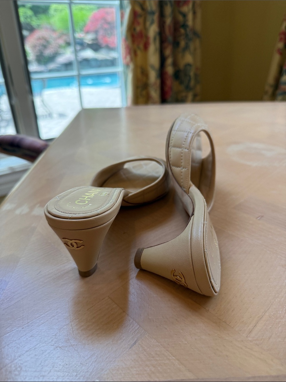 CHANEL Cream Quilted Leather Heel Mules with Gold CC on heel. Like new